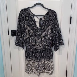 Adorable Romper in black and white NWT in size XL